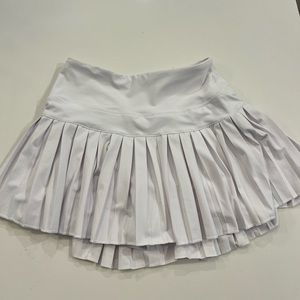 Gold hinge white skirt